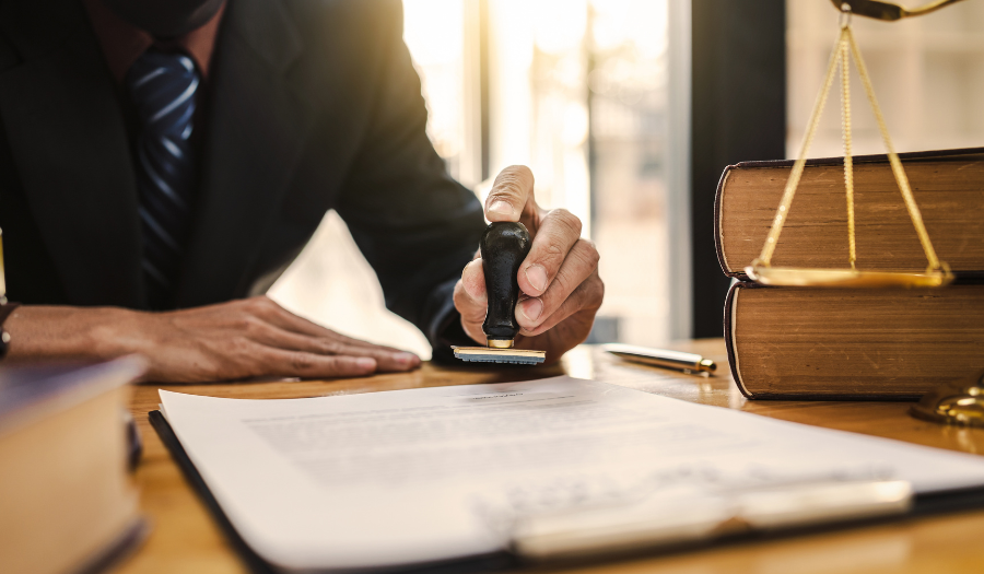 Legal professional stamping a document